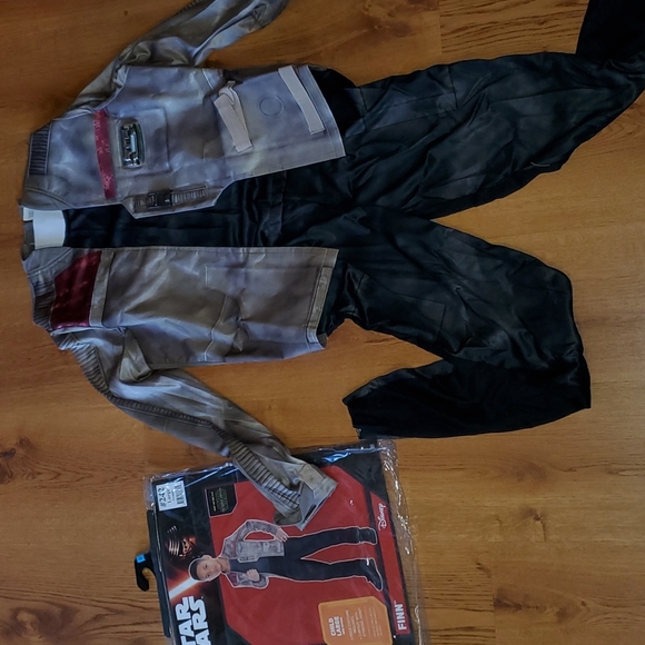 Star Wars Other - Star wars one piece Finn size large 12-14 brand new in package